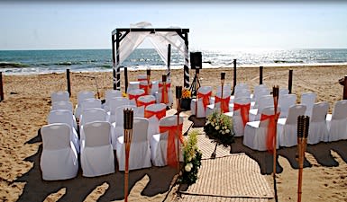 Blog: Walking barefoot down a golden-sand aisle image