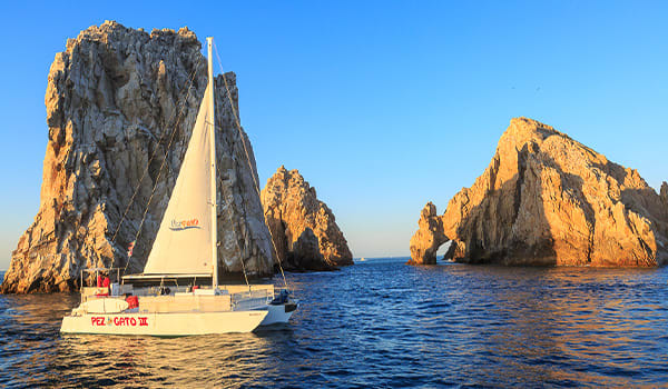 Blog: Cruise past El Arco at sunset in Los Cabos image