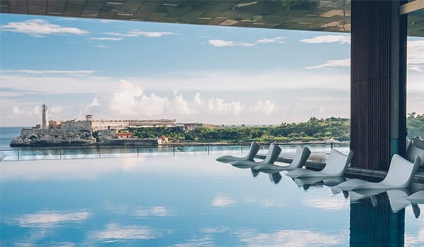 Blog: Lounge in an infinity pool overlooking Havana at Iberostar Grand Packard image