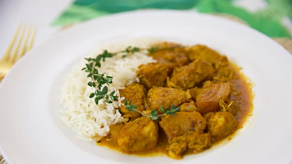 Blog : Soak up the island vibes over curry chicken image